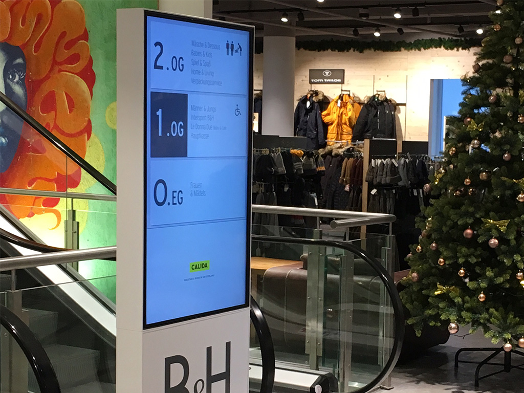 Digital signage as an information medium as a floor display in a department store